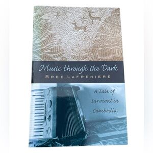 Music Through The Dark A Tale of Survival in Cambodia Memoir Softcover Book